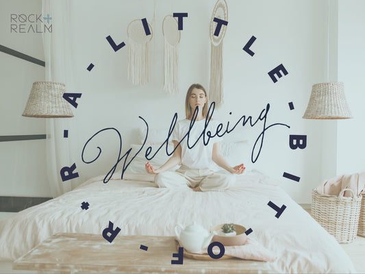 Wellbeing blog - girl meditates in her bedroom