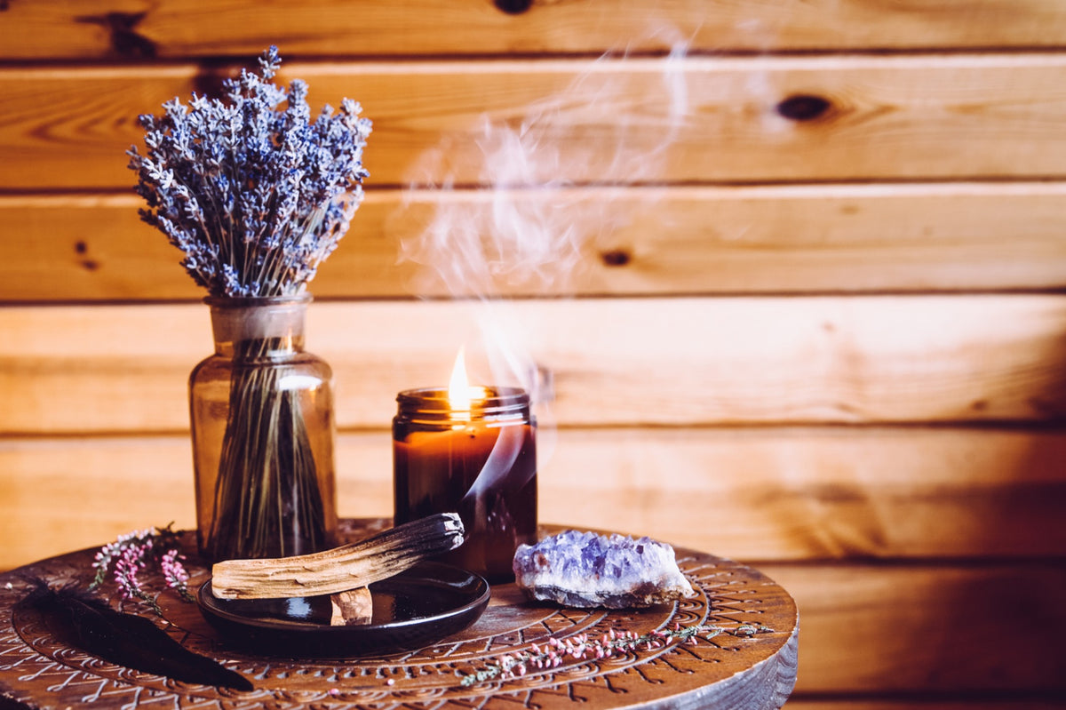 Autumn boho decor with candles and crystals