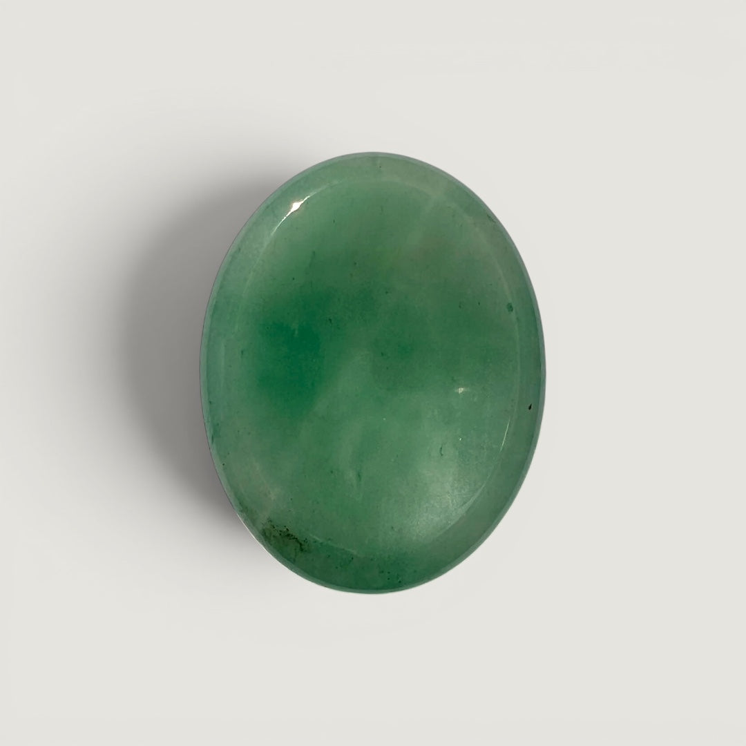 Rock + Realm Crystals smooth green aventurine worry stone with thumb dip for anxiety relief and positive energy.