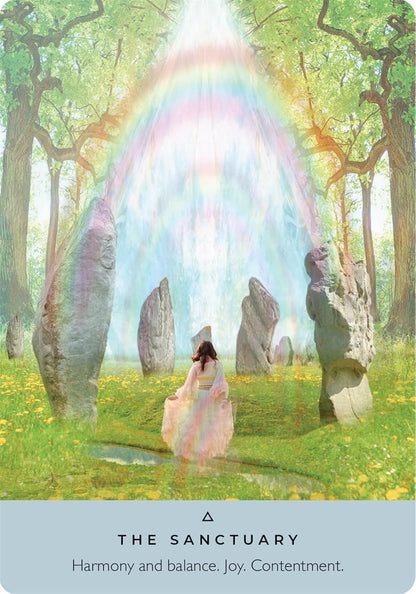 ancient Stones Oracle Card with woman in a pink dress standing under a rainbow arch in a forest with stone circles.