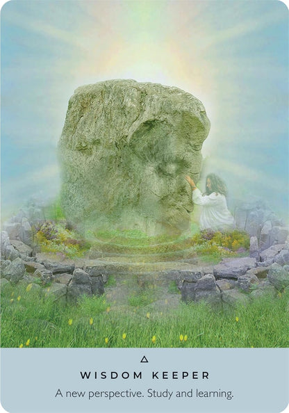 Ancient Stones Oracle Card with Stone monument with a person sitting on a rock, surrounded by grass and a rainbow, with text 'Wisdom Keeper' at the bottom.