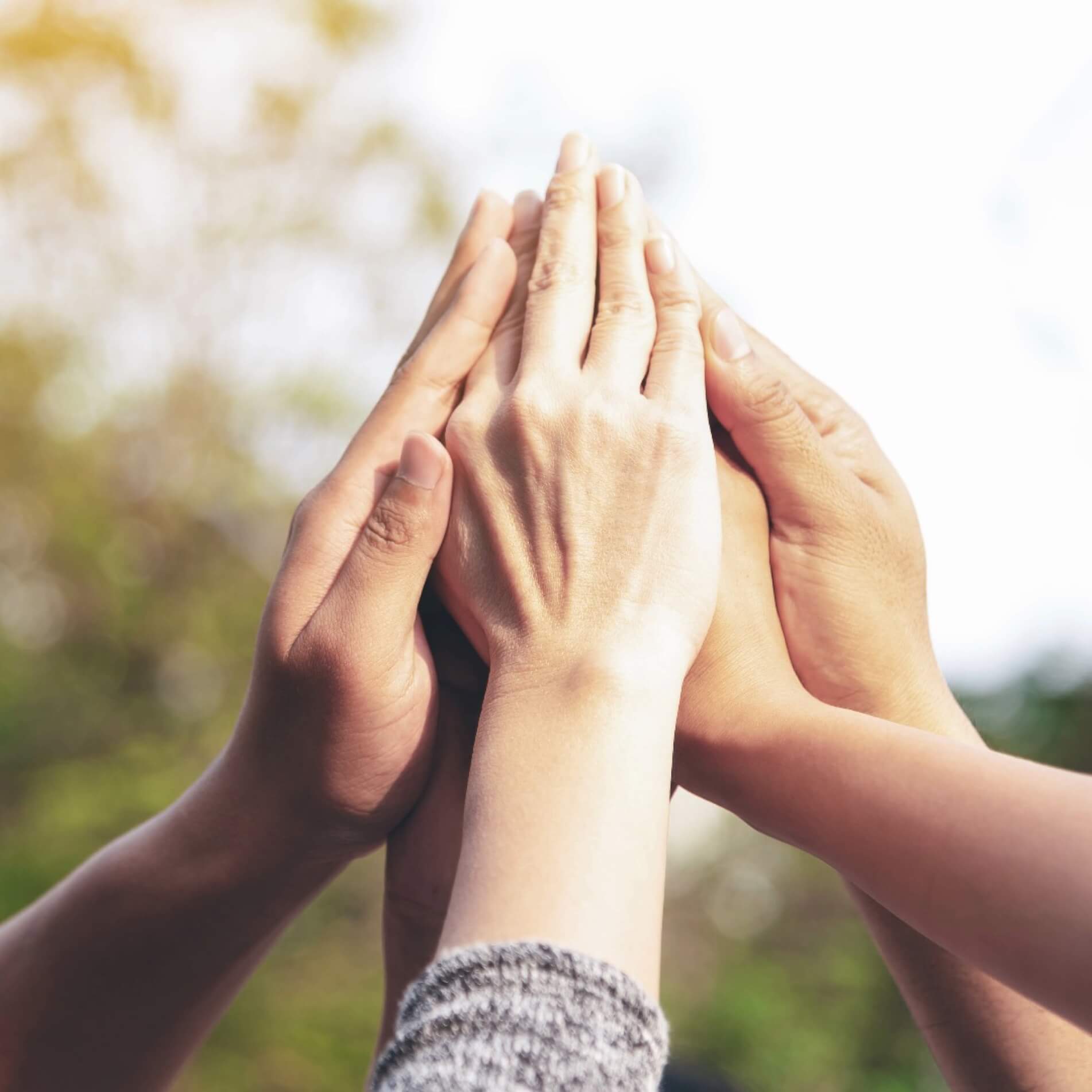 Crystal community connecting hands together