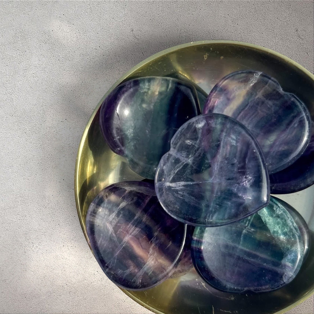 Rock + Realm Crystals blue and purple fluorite heart worry stones with polished surface, known for clarity and focus.