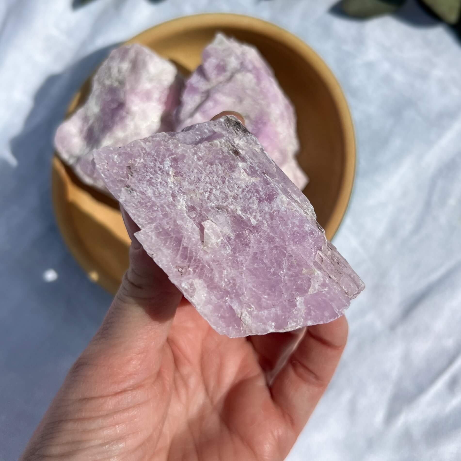 Pink extra large lilac coloured raw kunzite crystal piece side profile