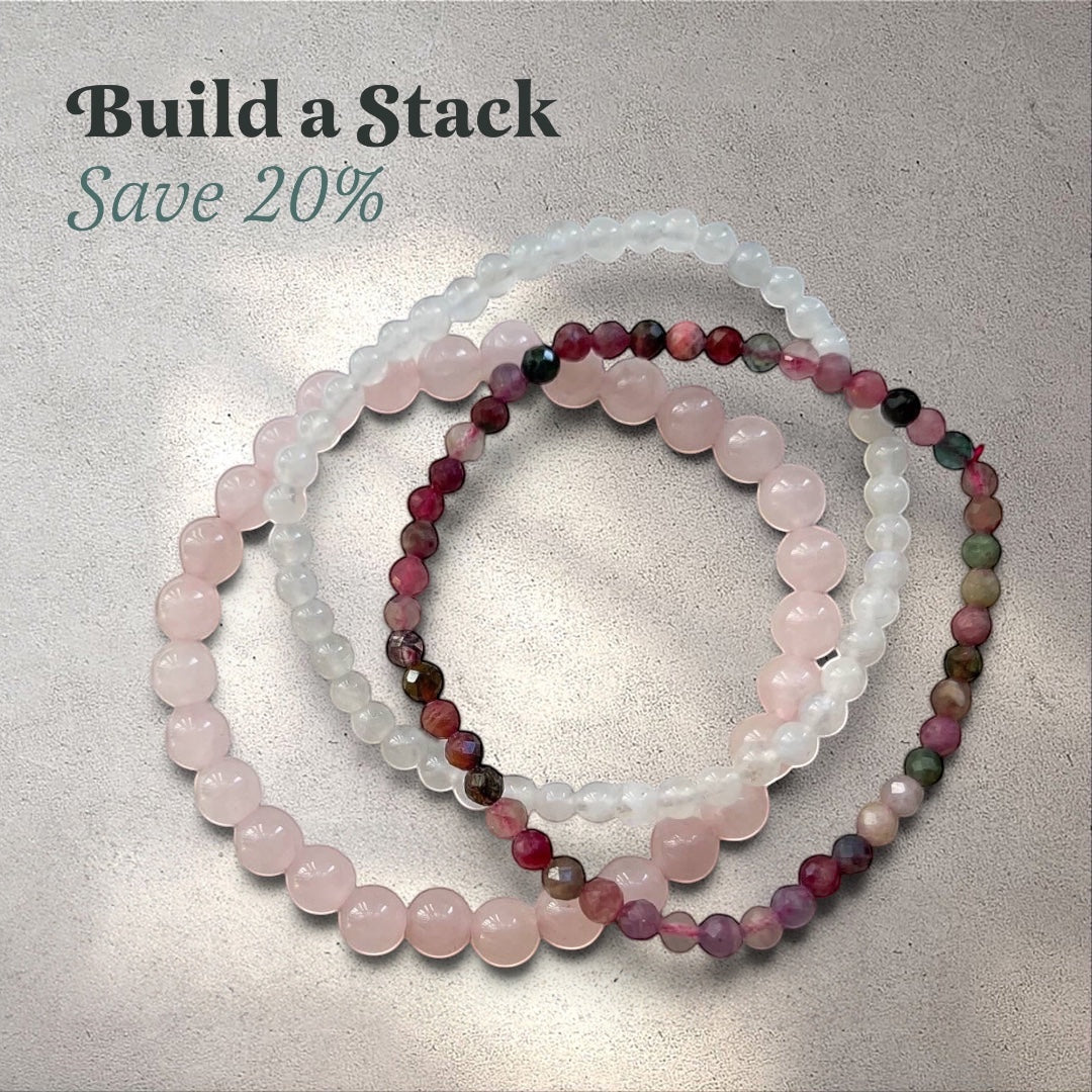 Rock + Realm Crystals stack of three beaded bracelets in pink rose quartz, white moonstone and multi-coloured tourmaline.
