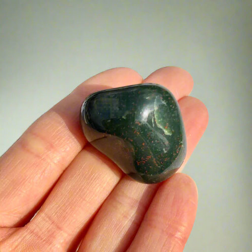 Extra large green bloodstone tumble stone with red flecks