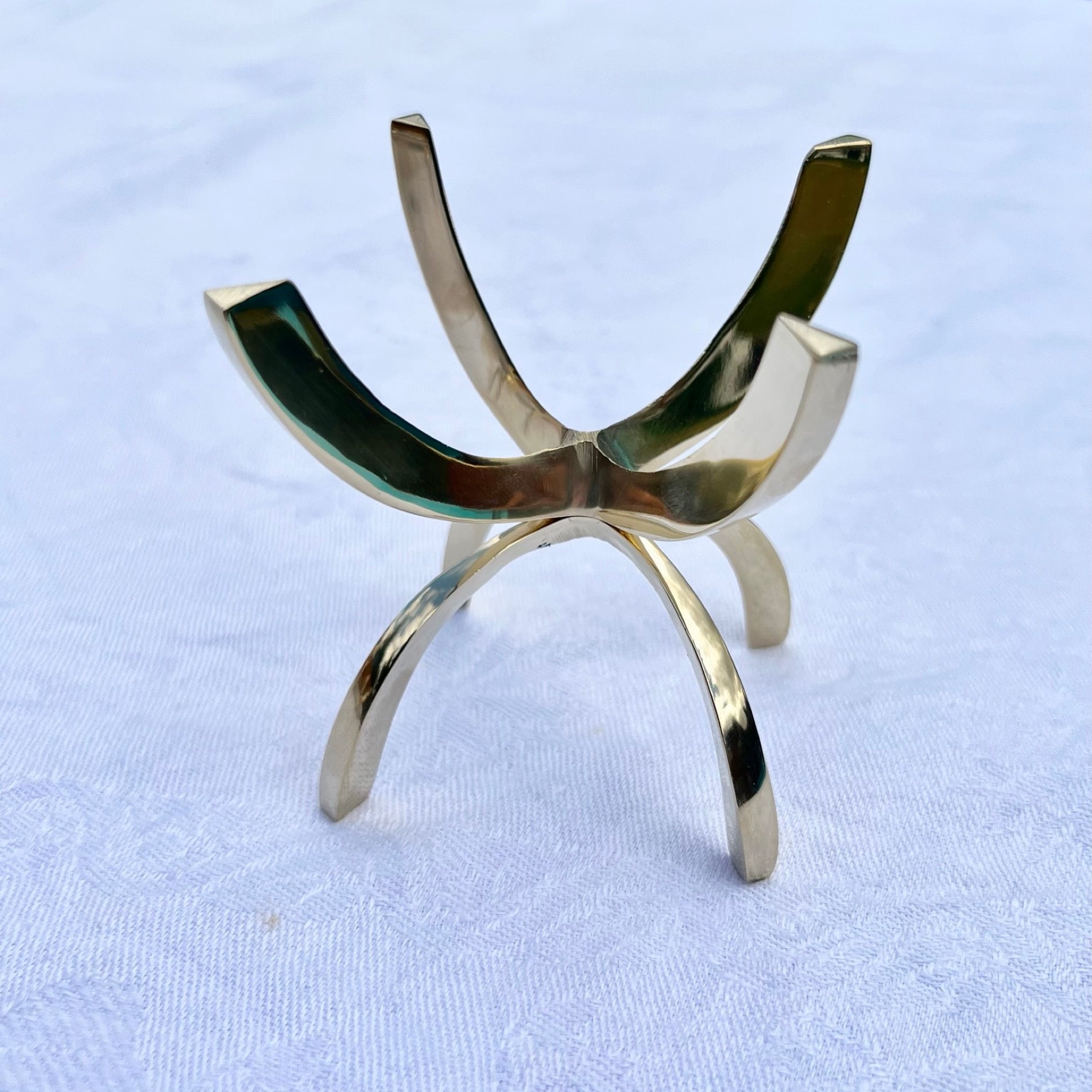 An extra large brass claw stand