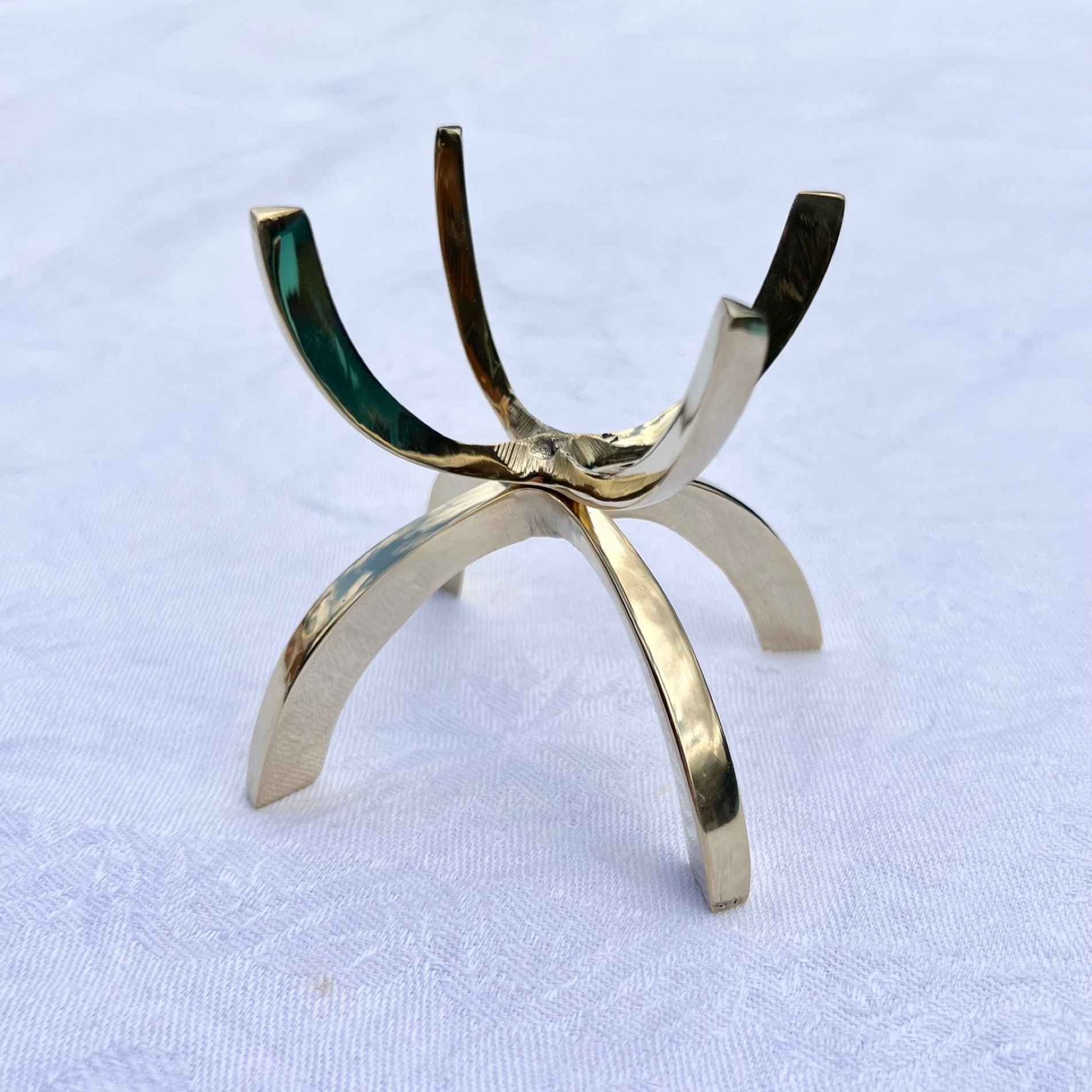 An extra large brass claw stand