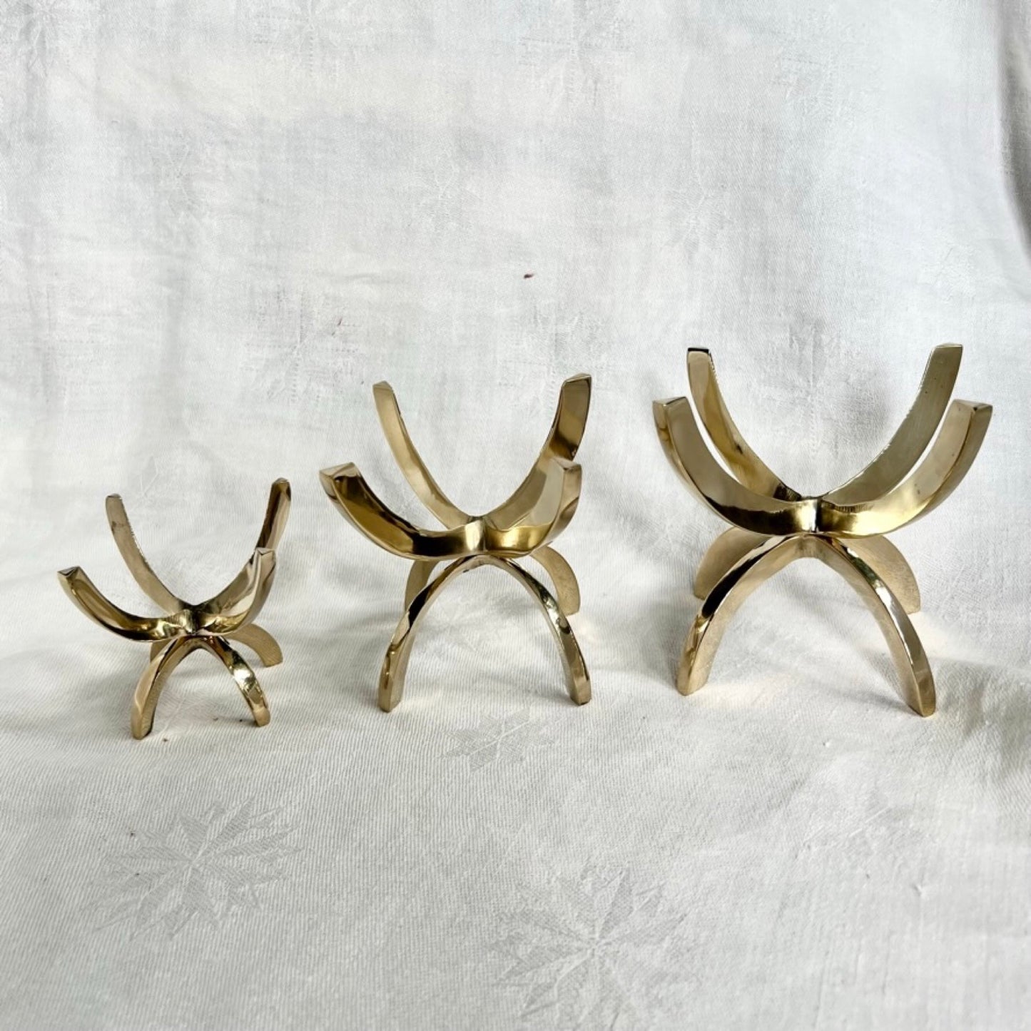 Three brass claw mineral stands size comparison