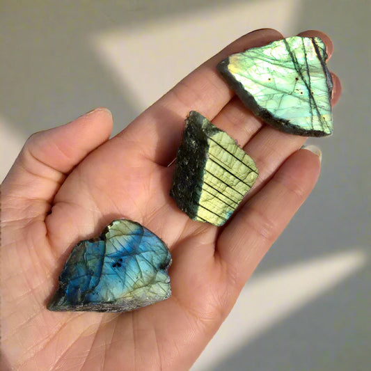 very flashy raw and polished blue and teal labradorite crystal pieces