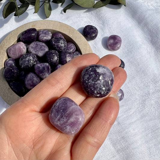 Beautiful purple lepidolite tumble stones