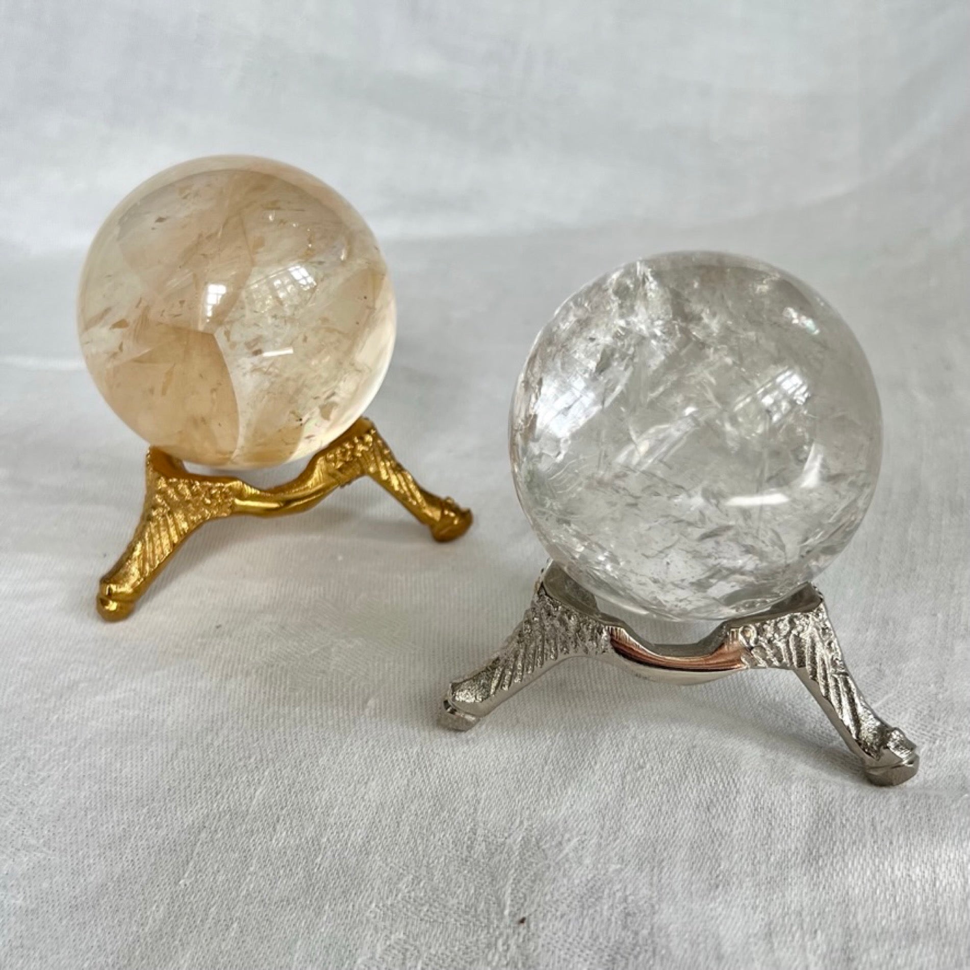 Silver nickel and gold vintage style small crystal sphere holders with crystal balls
